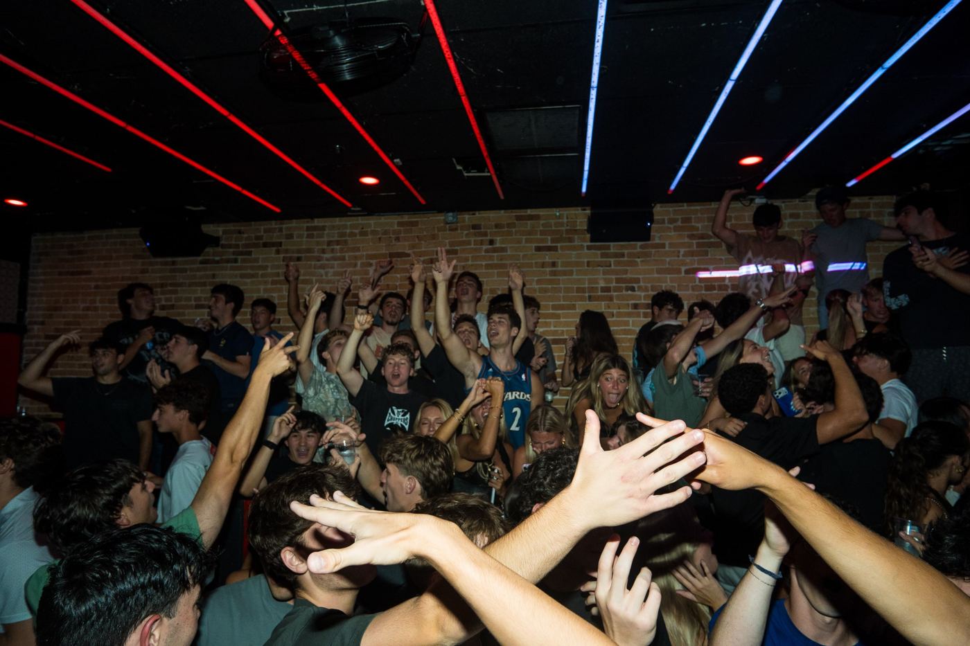 Packed floor at Rush under the ceiling tubes
